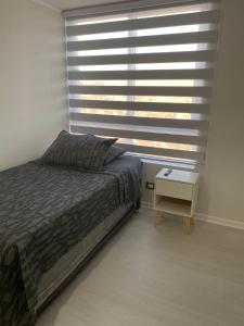 Postel nebo postele na pokoji v ubytování Departamento Vista Herradura Coquimbo + 18 fotografií