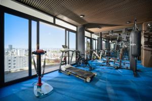 Fitness centrum a/nebo fitness zařízení v ubytování Golden Lotus Grand Da Nang - Panoramic Rooftop Bar & Daily Afternoon Tea