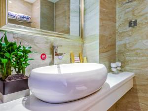 Ένα μπάνιο στο Oasis Hotel, Changsha Auto West Station Business School +57 φωτογραφίες
