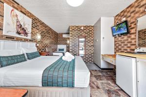 Katil atau katil-katil dalam bilik di Apple & Grape Motel