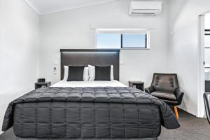 Katil atau katil-katil dalam bilik di Apple & Grape Motel