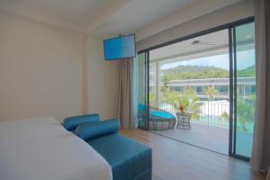 Postel nebo postele na pokoji v ubytování Infinity Aonang Krabi + 37 fotografií