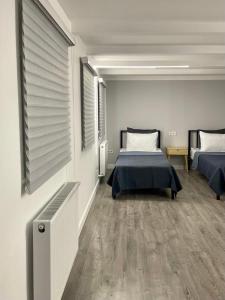 Postel nebo postele na pokoji v ubytování Express Inn