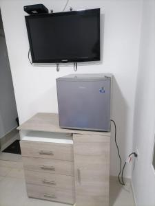 TV a/nebo společenská místnost v ubytování Hostel HA LUXURY