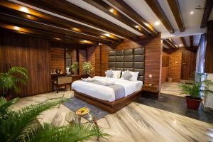 Ένα ή περισσότερα κρεβάτια σε δωμάτιο στο Kumari Star Inn