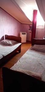 Ліжко або ліжка в номері Apartment Zurabi