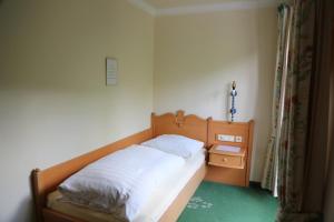 Letto o letti in una camera di Hotel Voglauerhof