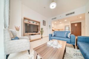 Posezení v ubytování Soothing 1BR at Safi 1B Town Square Dubailand by Deluxe Holiday Homes