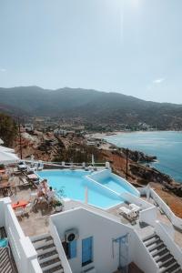 a view of a swimming pool from a villa at Hotel Petradi in Ios Chora