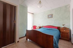 Postel nebo postele na pokoji v ubytování Albergo Miramonti