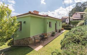 a view of a house with a yard at Pet Friendly Home In Pravia With Kitchen in Pravia