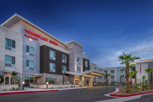 a rendering of the front of a hotel at TownePlace Suites by Marriott San Bernardino Loma Linda in Loma Linda