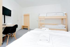 Postel nebo postele na pokoji v ubytování Penzion Kraličák