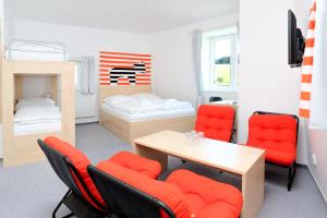 Postel nebo postele na pokoji v ubytování Penzion Kraličák