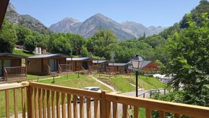 a view of a resort with mountains in the background at Panticosa Lodge in Panticosa