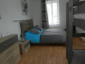 Postel nebo postele na pokoji v ubytování Gîte Utah + 4 fotografie