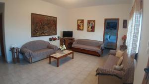 Posezení v ubytování Johnie's Villa