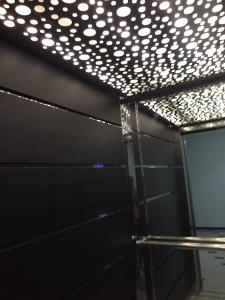 a room with a ceiling with lights on it at Уютен нов апартамент - Стара Загора с две спални in Stara Zagora