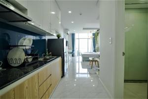 a kitchen with a sink and a counter top at Ocean View Studio,Ocean View 3BR-apartment, Sealinks City, Mui Ne in Phan Thiet