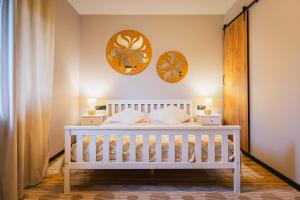 Posteľ alebo postele v izbe v ubytovaní Apartamenty u Lolka