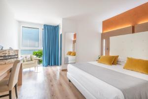 Postel nebo postele na pokoji v ubytování Kriss Internazionale Hotel + 37 fotografií