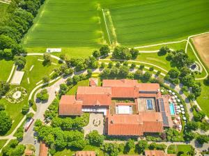 an overhead view of a house with a yard at Parkhotel Bad Griesbach in Bad Griesbach