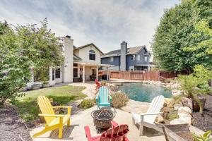 a backyard with chairs and a swimming pool at Sacramento Home with Fire Pit 15 Mi to Downtown! in Sacramento
