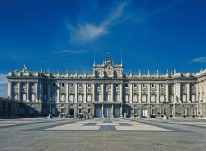 a large white building with a blue sky in the background at Occidental Castellana Norte in Madrid
