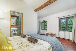 Rúm í herbergi á Parenthèse en Luberon