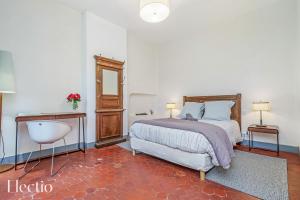 Rúm í herbergi á Parenthèse en Luberon