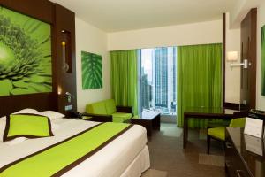 Riu Plaza Panamá客房内的一张或多张床位