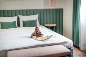 Posteľ alebo postele v izbe v ubytovaní Hotel H12****