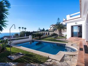 a swimming pool in the backyard of a house at REf 4 CASA BLANCA in Zahara de los Atunes
