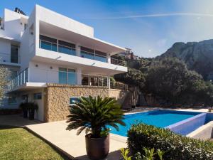 a villa with a swimming pool and a house at REf 6 VILLA TARA in Zahara de los Atunes