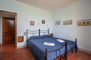 Postel nebo postele na pokoji v ubytování Agriturismo Metina