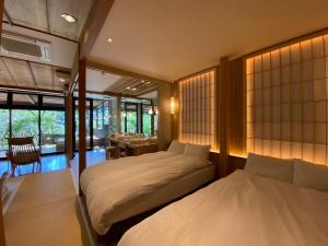 阿施卡里怀石日式旅馆客房内的一张或多张床位