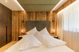 Hotel Garni Jagdhof客房内的一张或多张床位