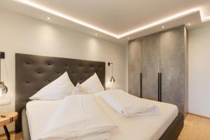 Hotel Garni Jagdhof客房内的一张或多张床位
