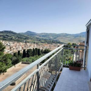 a balcony with a view of a city at La Rosa dei venti in Calatafimi