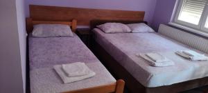Ένα ή περισσότερα κρεβάτια σε δωμάτιο στο Guest House Trajkovic Jagodina