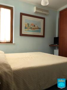 Postel nebo postele na pokoji v ubytování Blu Mare
