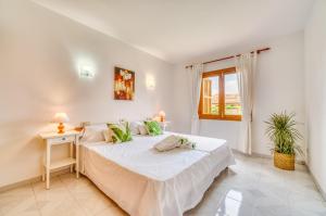 Posteľ alebo postele v izbe v ubytovaní Ideal Property Mallorca - Rosas 28