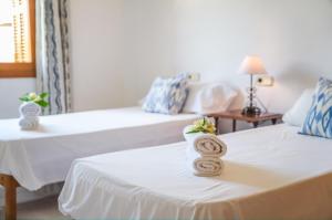 Posteľ alebo postele v izbe v ubytovaní Ideal Property Mallorca - Rosas 28