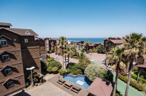 an aerial view of a resort with a swimming pool at Dyne Resort in Jeju