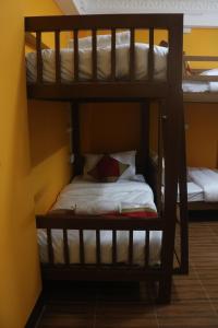 Voodi või voodid majutusasutuse Nepalaya Home Hostel toas
