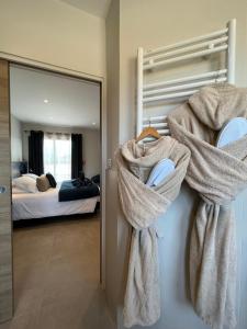 Postel nebo postele na pokoji v ubytování Le Petit Hôtel de Pianottoli-Caldarello