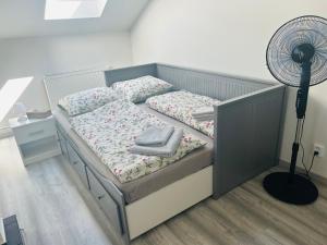 Posteľ alebo postele v izbe v ubytovaní Apartman Theresa