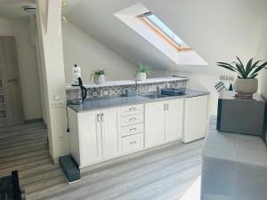 Kuchyňa alebo kuchynka v ubytovaní Apartman Theresa
