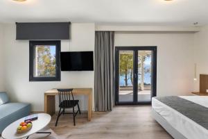 Ένα ή περισσότερα κρεβάτια σε δωμάτιο στο Villa Kelyfos