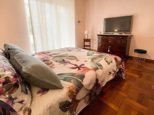 En eller flere senge i et værelse på Casa Vacanze Gianfry Lodge